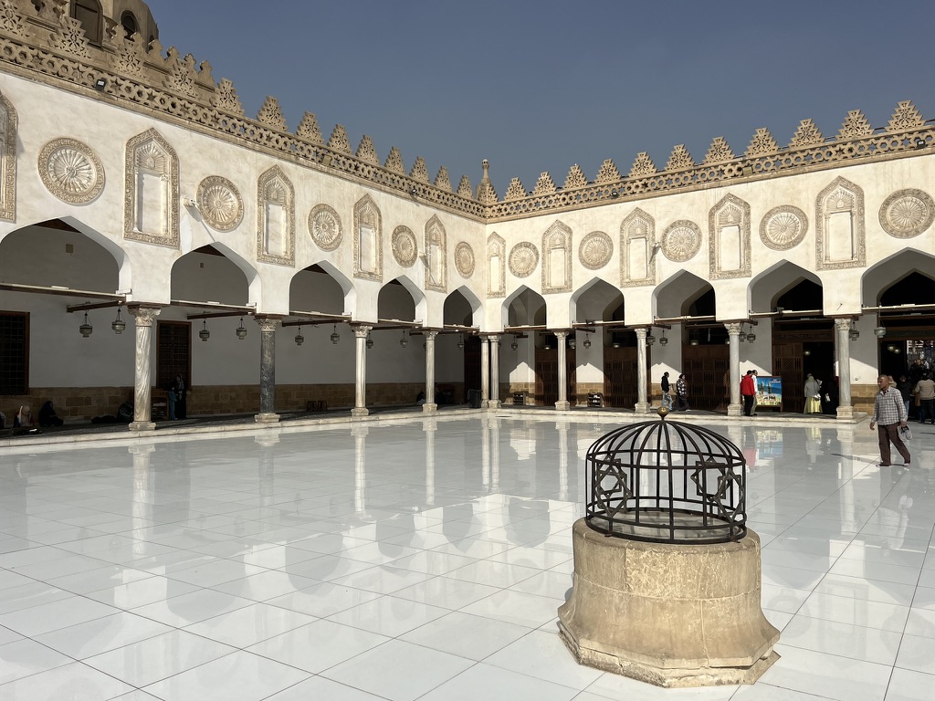 Founded in 970 AD, the Al-Azhar Mosque in Islamic Cairo is renowned for its vast white marble courtyard, elegant Fatimid-style arches