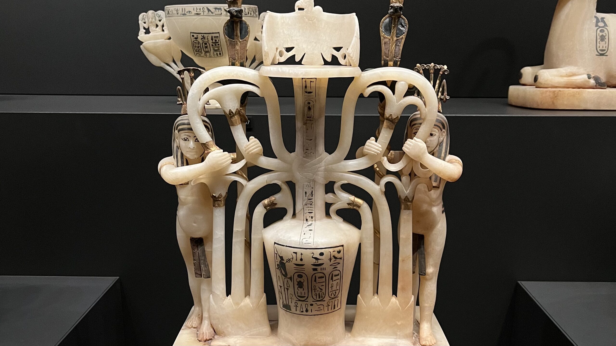 Grand Egyptian Museum guide - exquisite alabaster perfume vase from the tomb of Tutankhamun