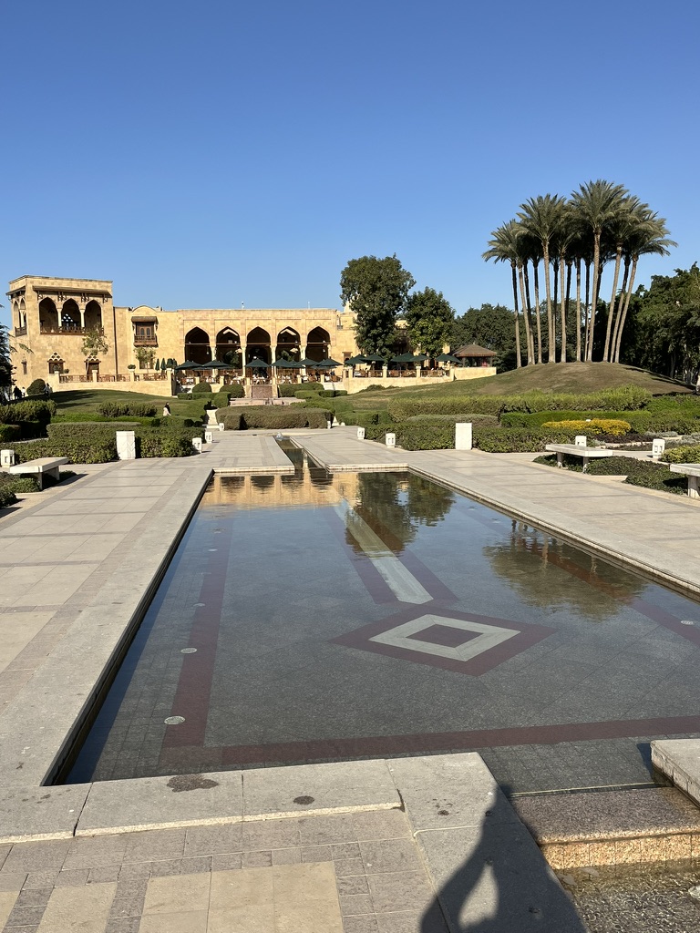 Al-Azhar Park, a 74-acre public park built atop a 500-year-old accumulation of debris, now serving as a major green space in the city.