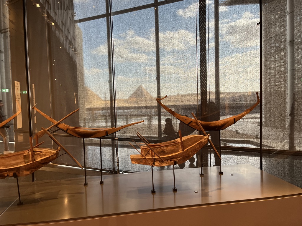 Seeing this ancient cedar ship framed by the Great Pyramid is a reminder that some journeys never truly end.