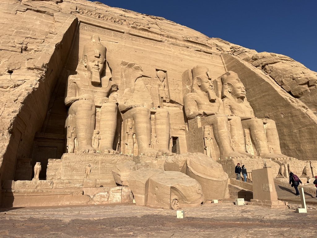 The colossal seated statues of Ramses II guard the entrance to the Great Temple at Abu Simbel.