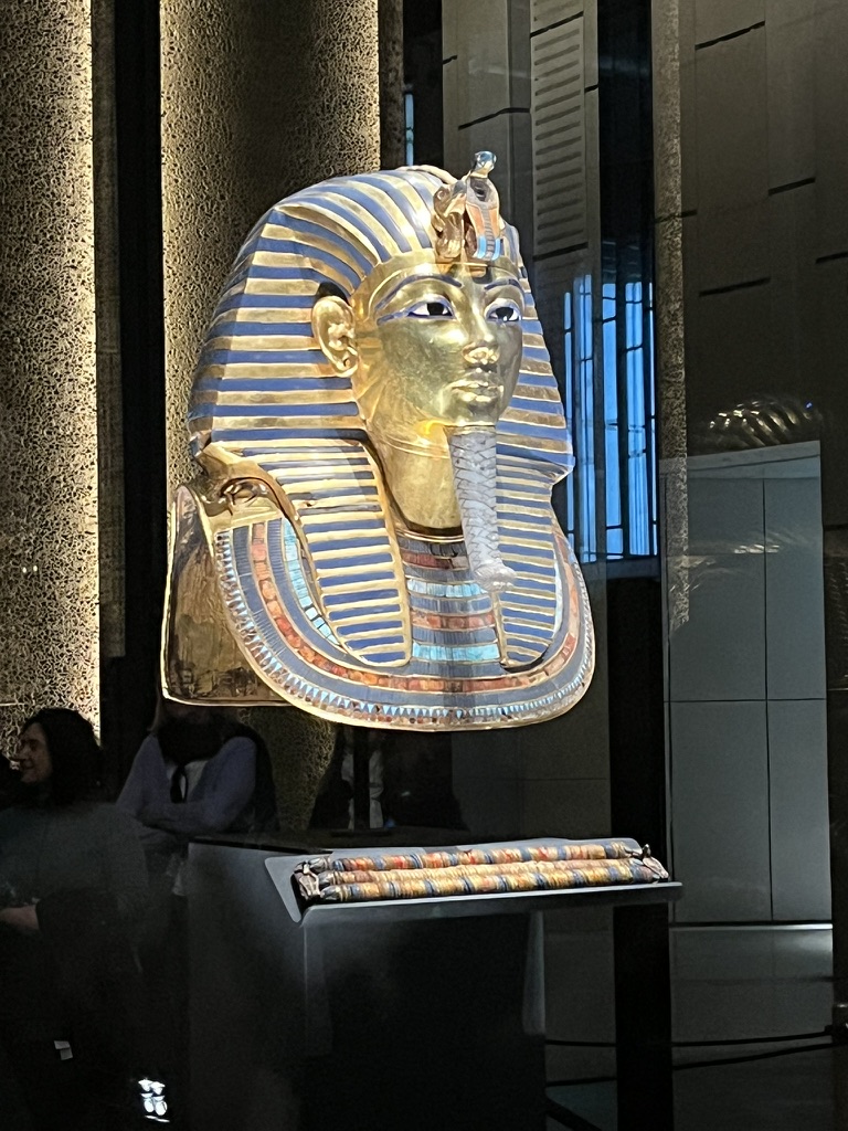 The funerary mask of the 18th Dynasty Pharaoh Tutankhamun in GEM, crafted from over 10kg of solid gold and inlaid with semi-precious stones and colored glass.