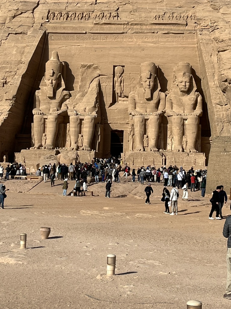Carved directly into the sandstone cliffs of Nubia, the Great Temple of Abu Simbel features four colossal seated statues of Ramesses II guarding the entrance.