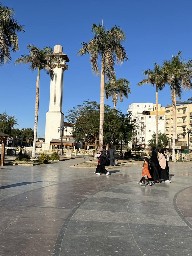 The large open plaza in front of Luxor Temple, featuring the famous mosque integrated into the ancient ruins.