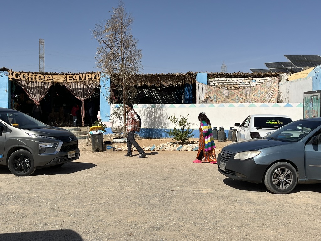 A solitary rest house and café providing a brief desert oasis for travelers making the three-hour journey from Aswan to the Sudanese border.
