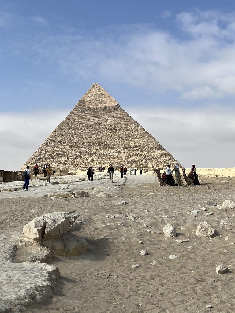 No self-guided mission to Egypt is complete without standing at the foot of the last remaining Ancient Wonder. Navigating the Giza Plateau on your own terms allows you to bypass the tour bus crowds and find those quiet, sandy corners where the scale of the pyramids truly hits you.