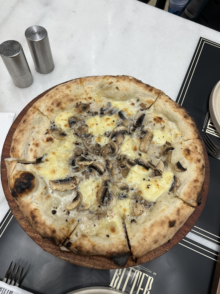 Mushrooms & Truffle Pizza at Bittersweet, with buffalo mozzarella cheese and drizzled with truffle oil.
