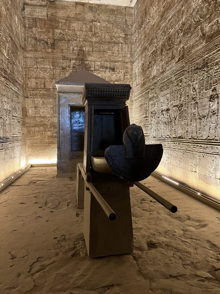 The ceremonial granite barque (sacred boat) of Horus inside the inner sanctuary of the Temple of Edfu.